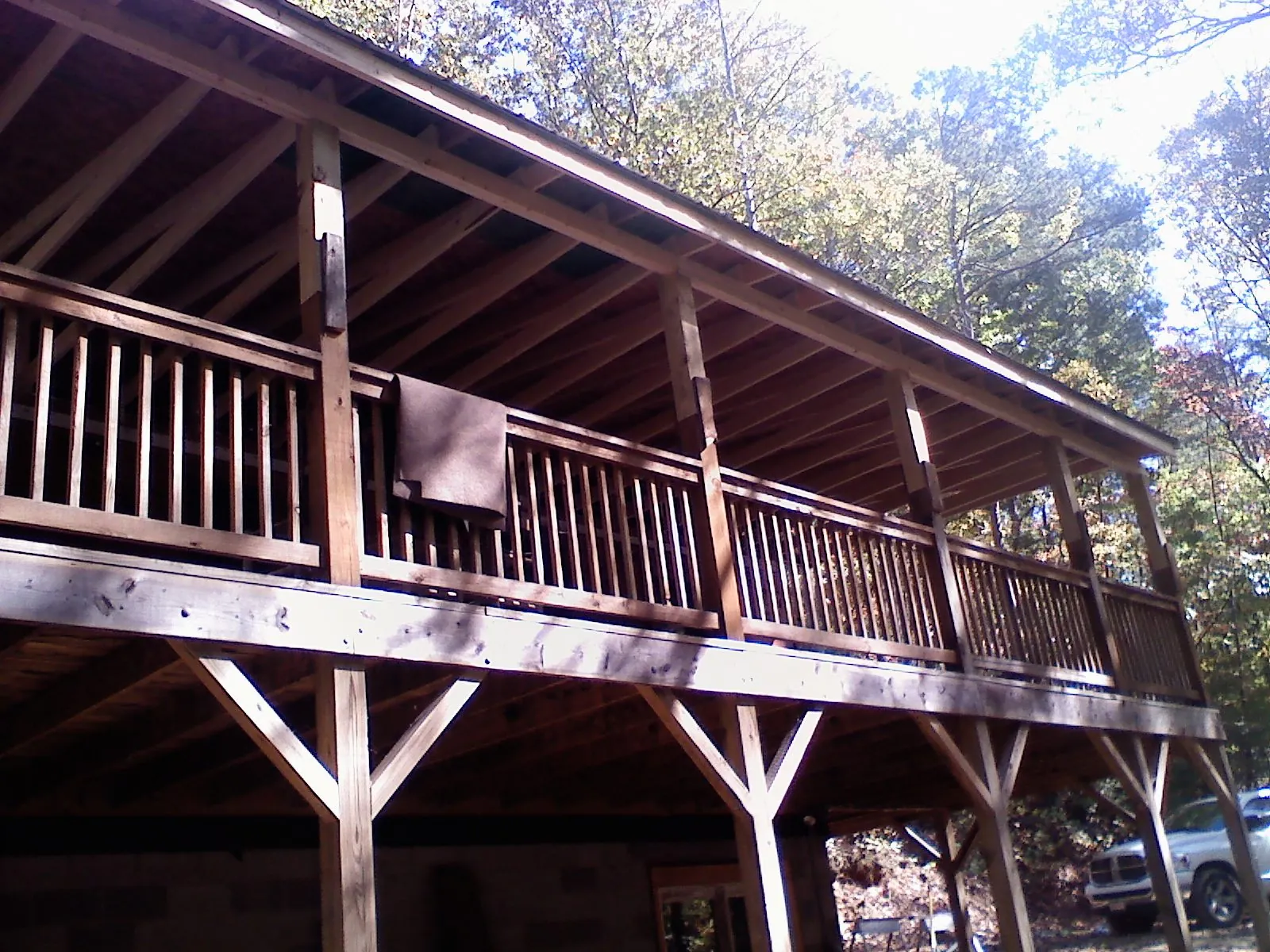 Timber framing under a new elevated porch and deck — Roof Leak Repair in Englewood by Roofing Brothers